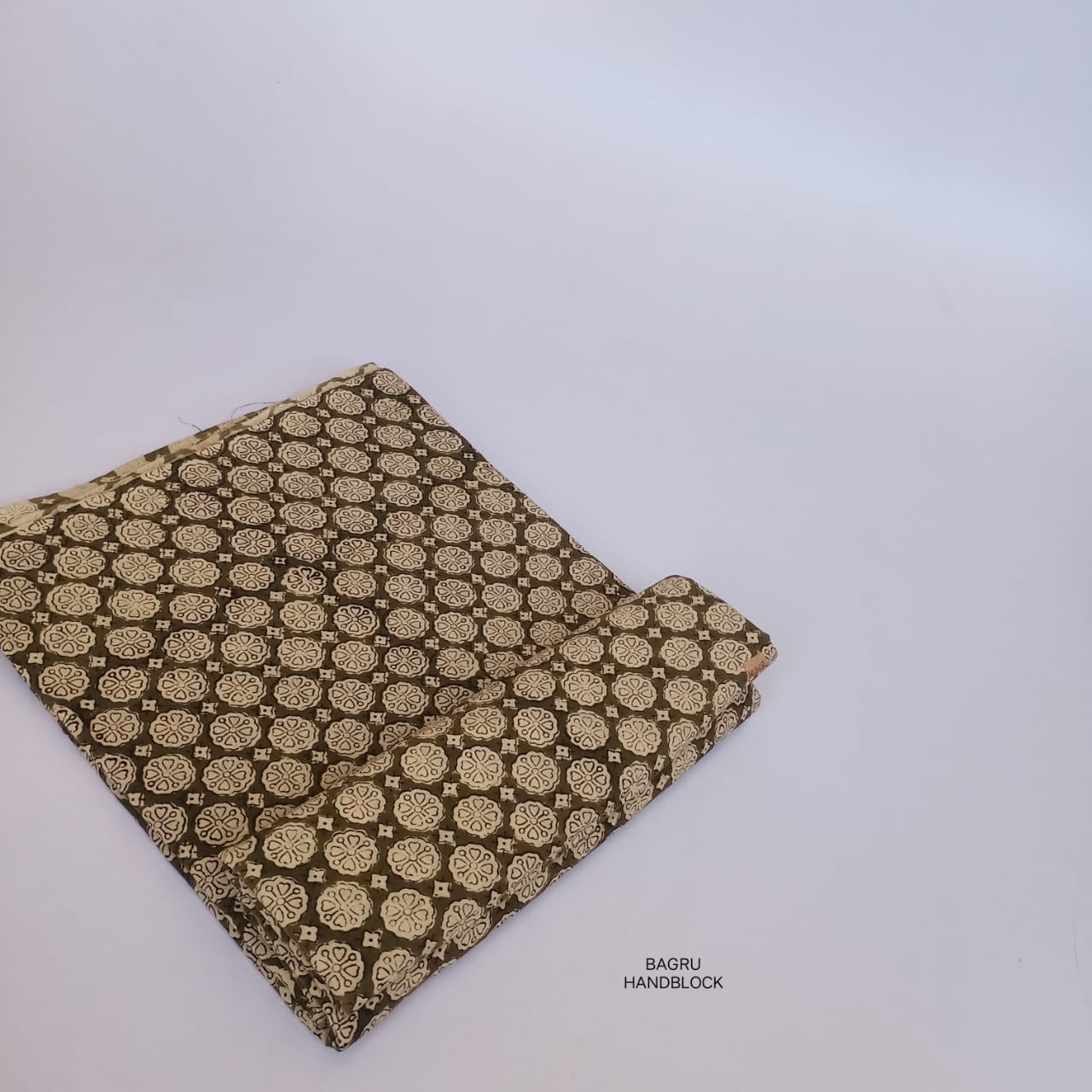 Handcrafted Bagru cotton fabric in black with traditional butti print, ethically made for wholesale textile sourcing.